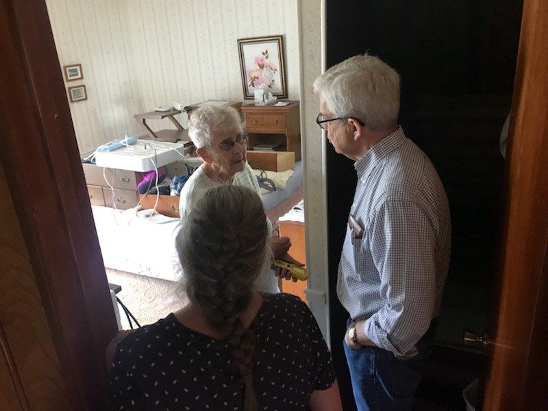 Lt. Gov. Mike Cooney speaks to Dorthy Opheim